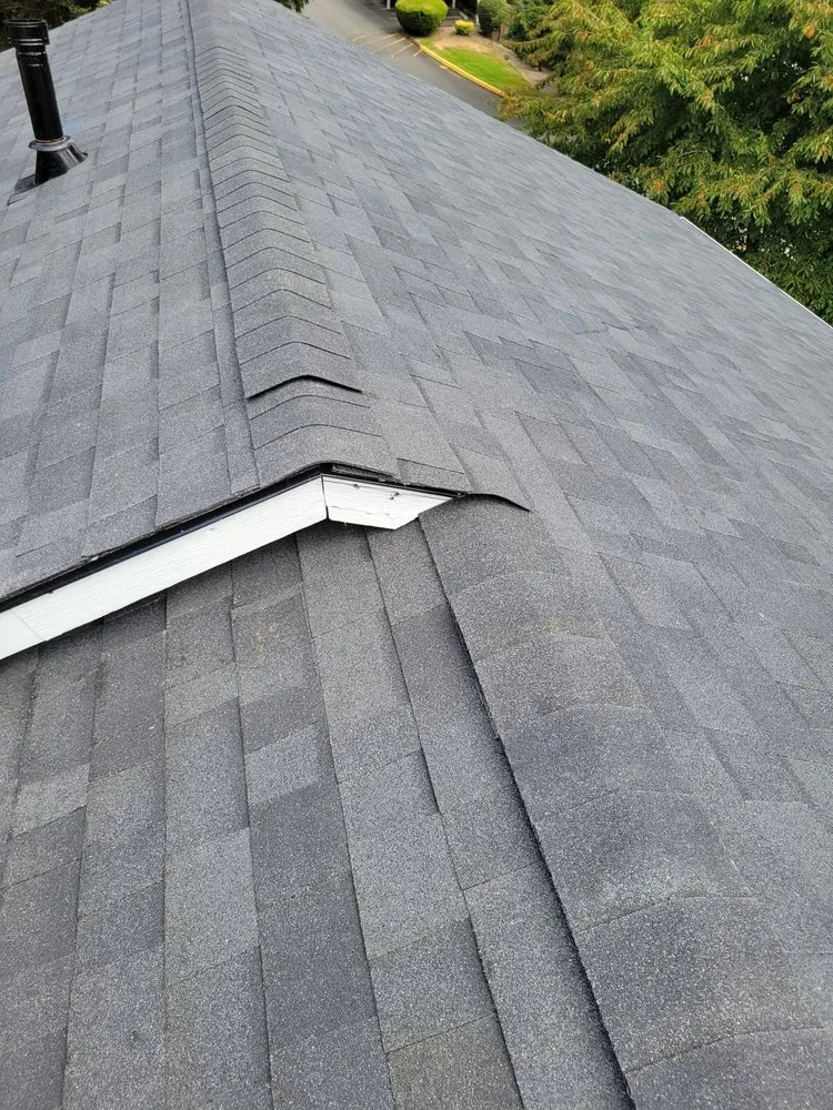 Slide of Checkamte Roofing and Construction