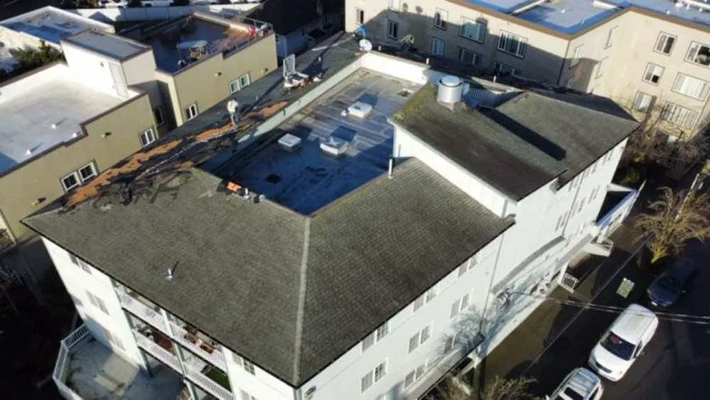 Slide of Checkmate Roofing and Construction