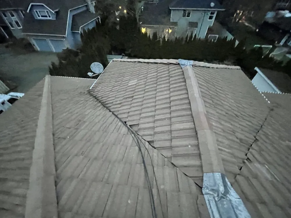 Slide of Checkmate Roofing and Construction