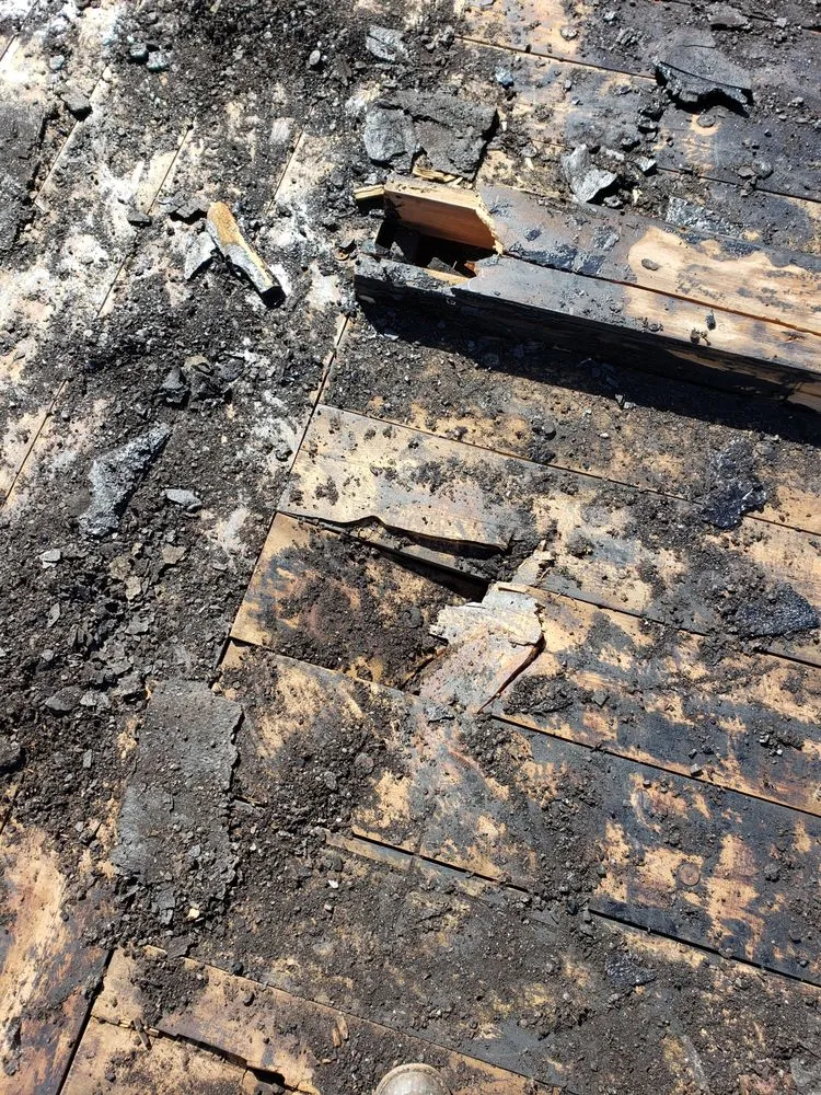 Slide of Chelinga Roofing