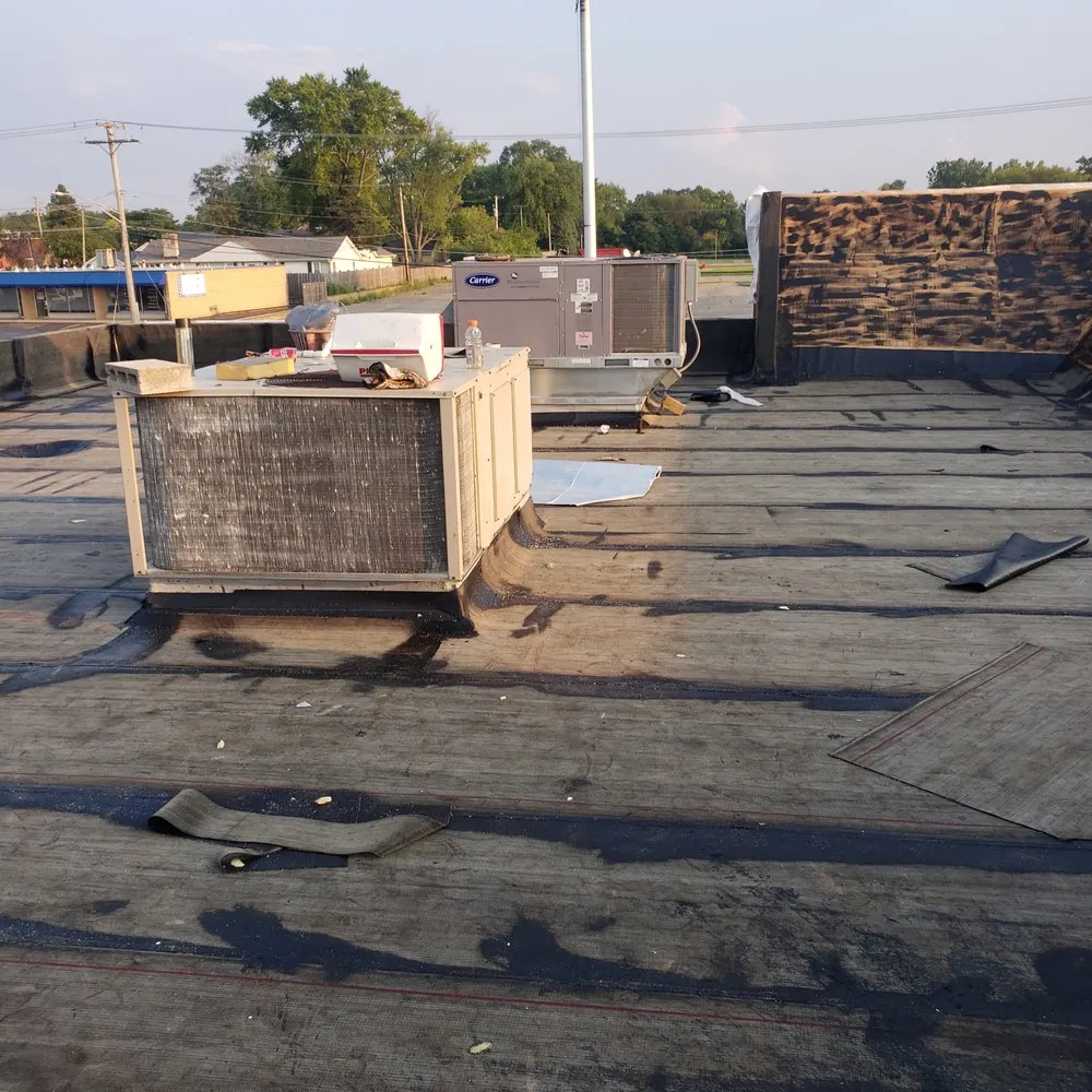 Slide of Chelinga Roofing