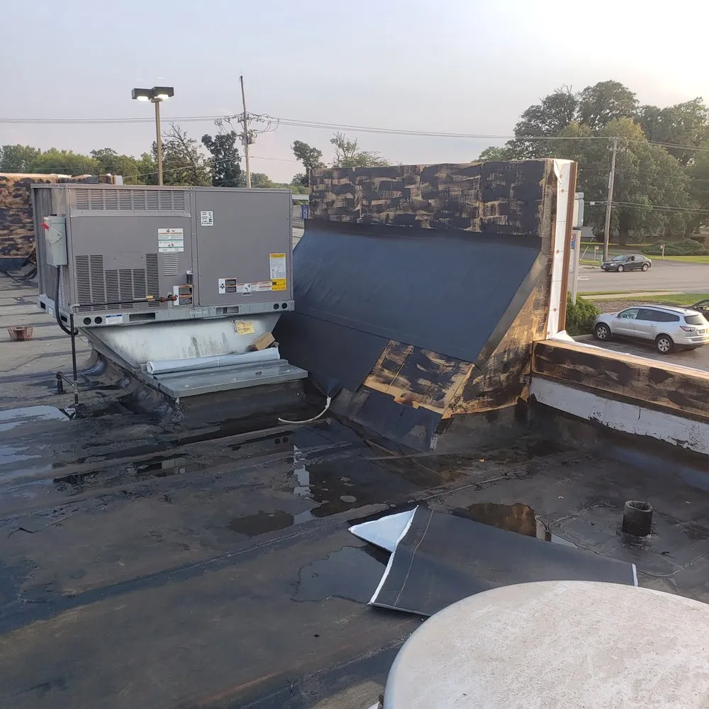 Slide of Chelinga Roofing