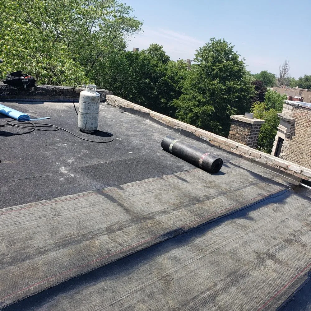 Slide of Chelinga Roofing