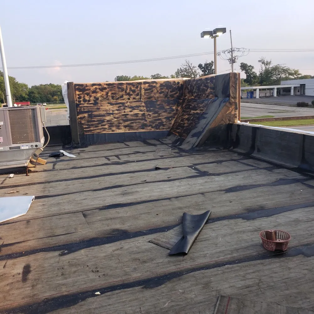 Slide of Chelinga Roofing