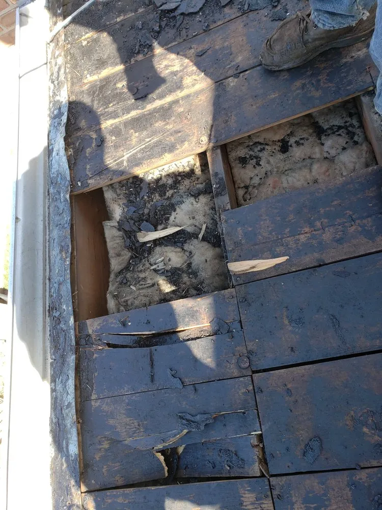 Slide of Chelinga Roofing