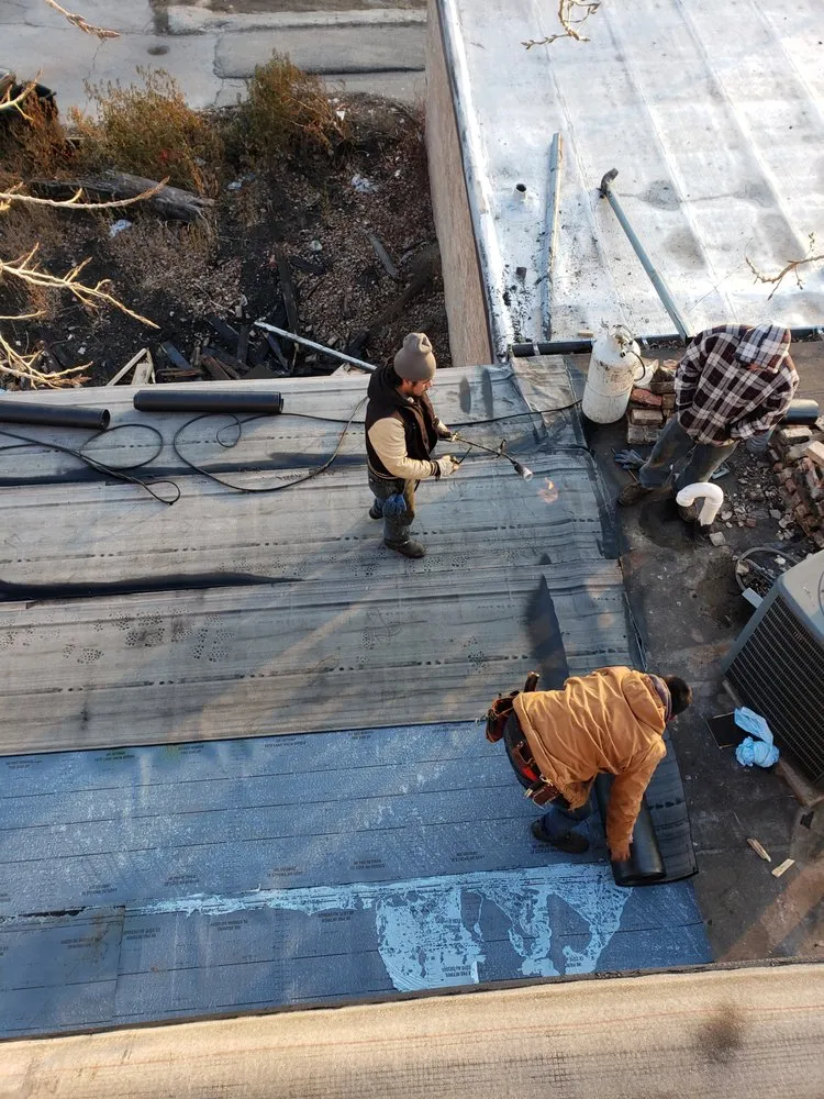 Slide of Chelinga Roofing