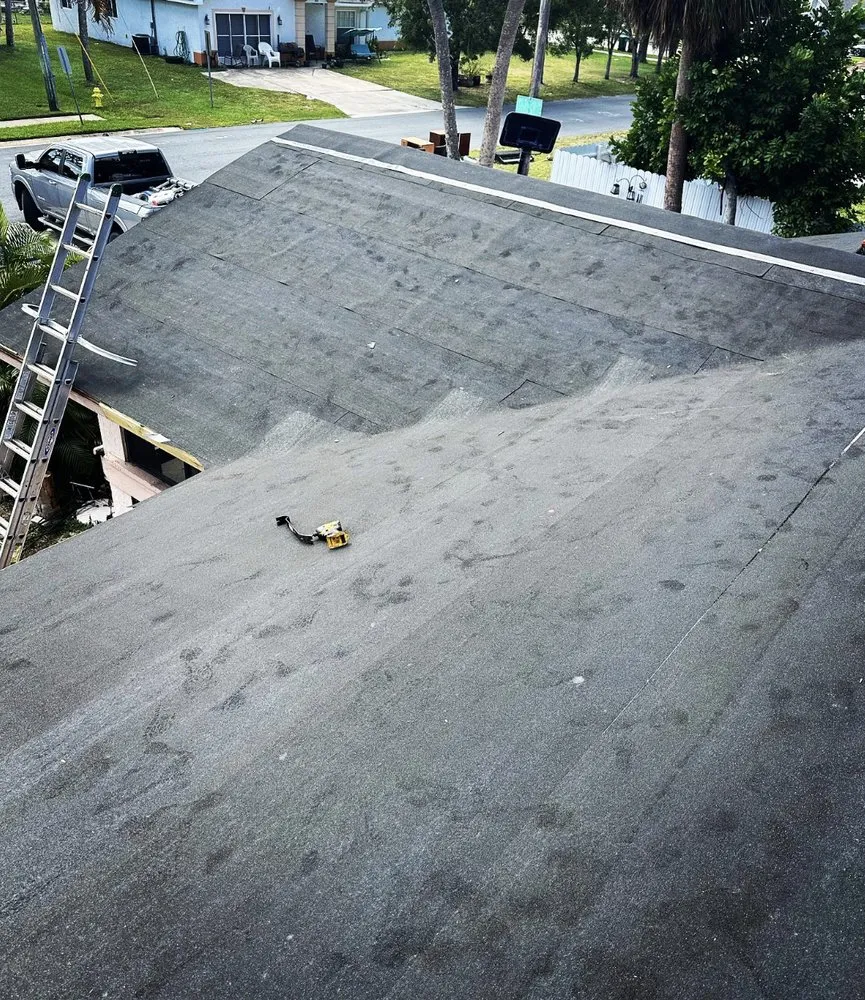 Slide of Chelle Roofing