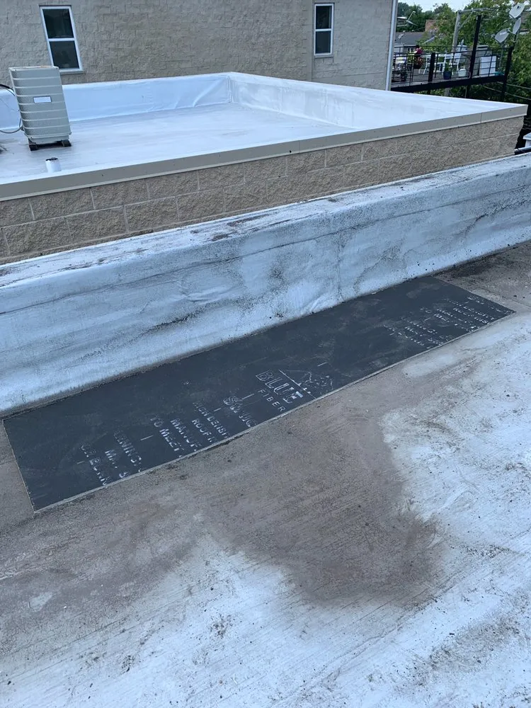 Slide of Chez Roofing & Construction