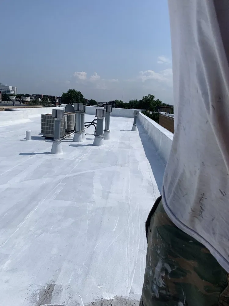 Slide of Chez Roofing & Construction