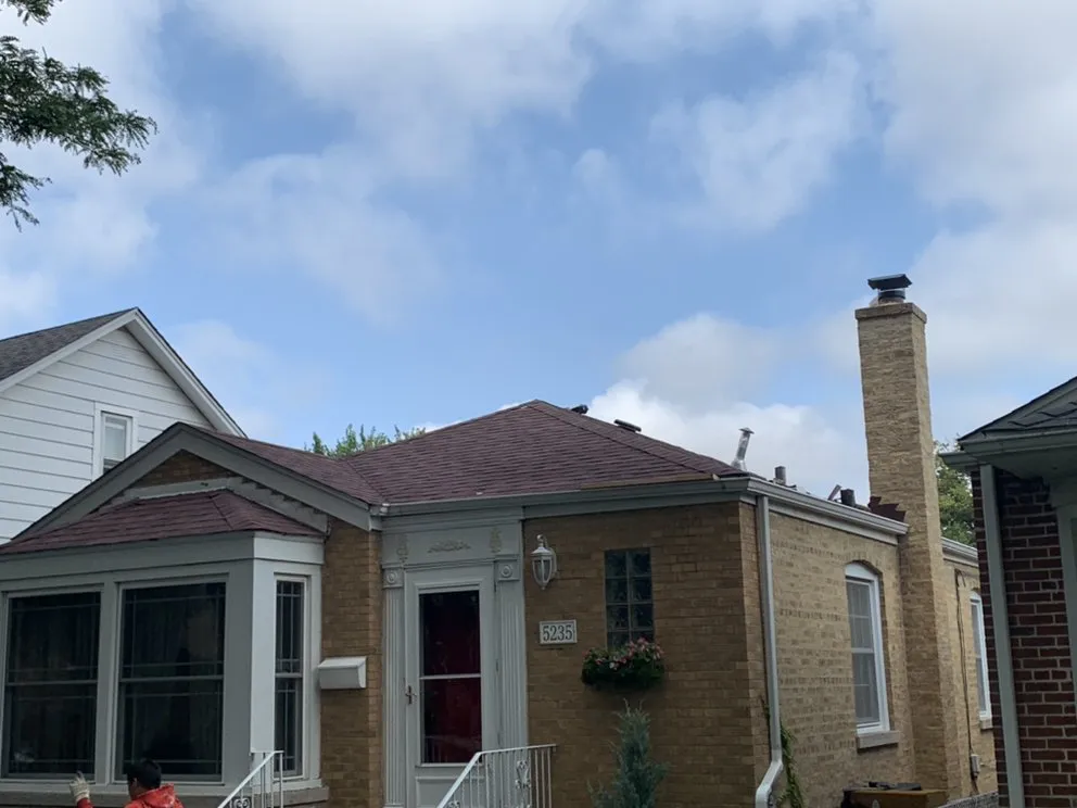 Slide of Chicago Local Roofer