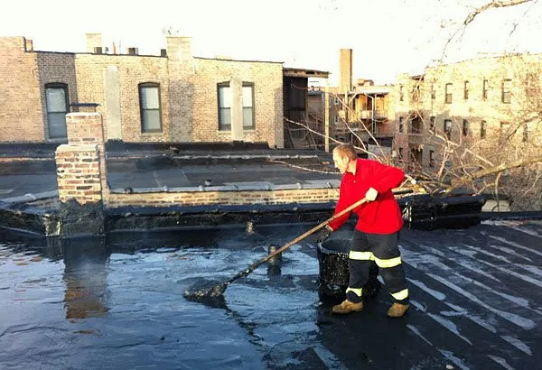 Slide of Chicago Roof Repair