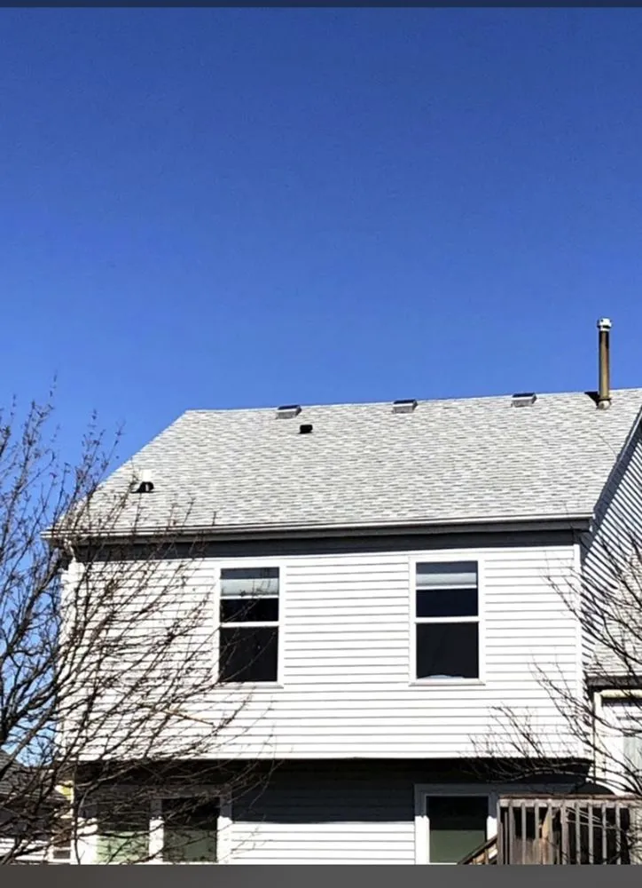 Slide of Chicago Roofing Repairs