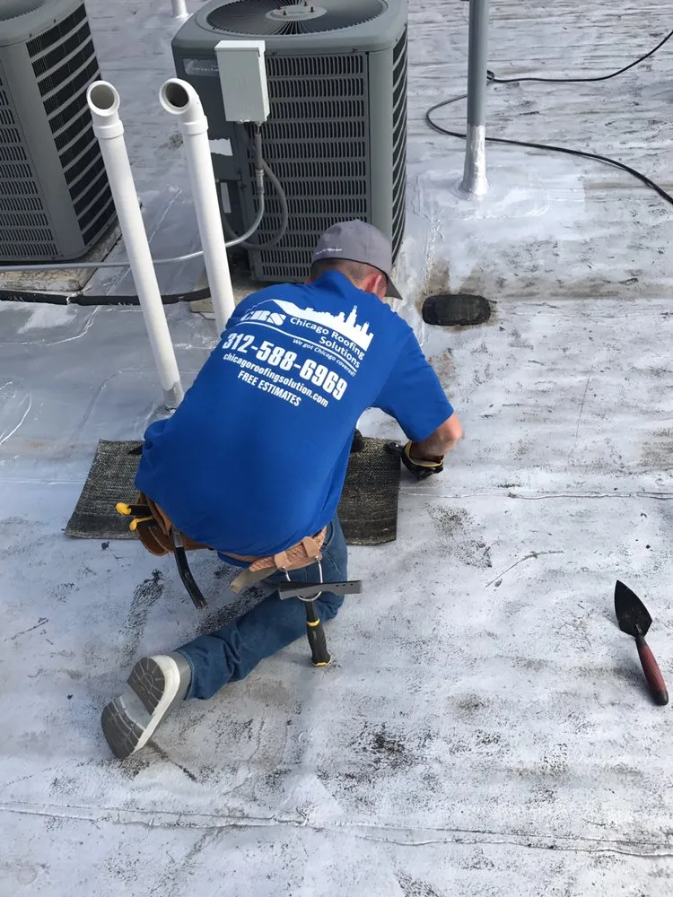 Slide of Chicago Roofing Solutions