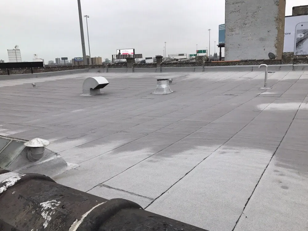 Slide of Chicago Roofing Solutions