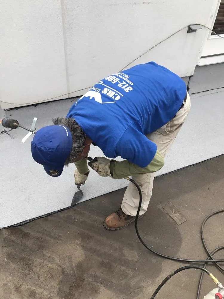 Slide of Chicago Roofing Solutions