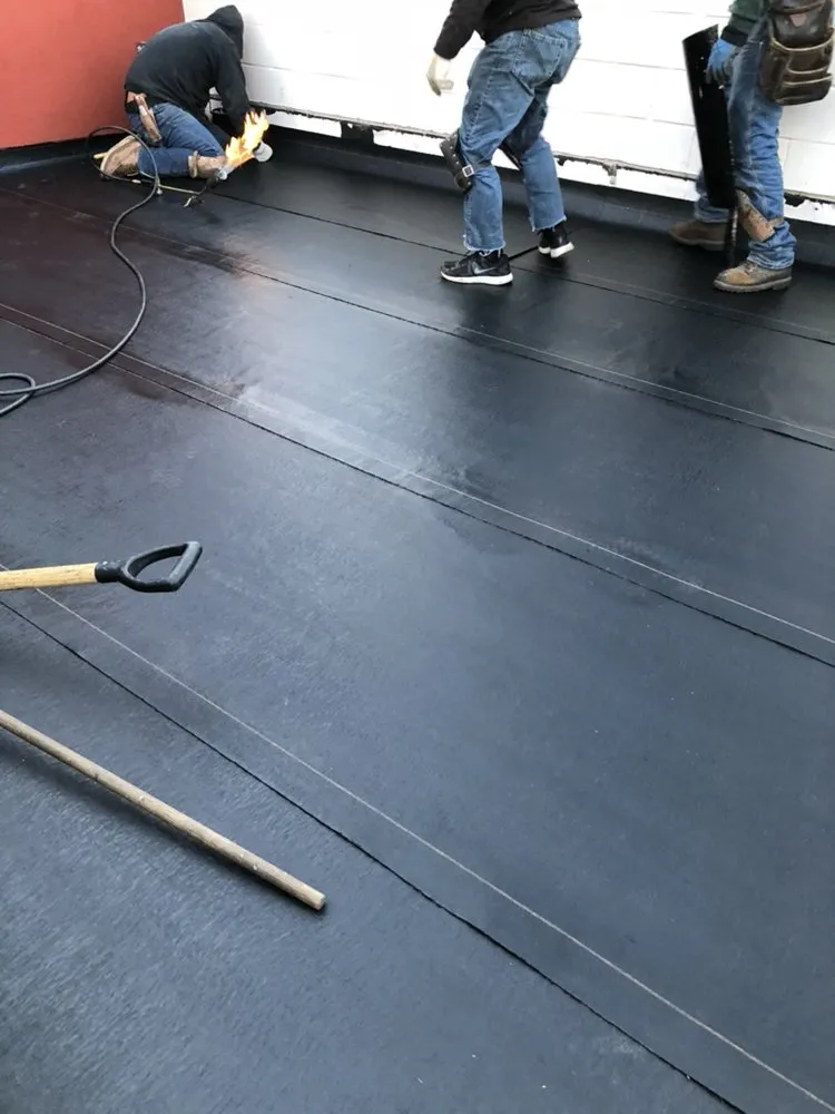 Slide of Chicago Roofing Solutions