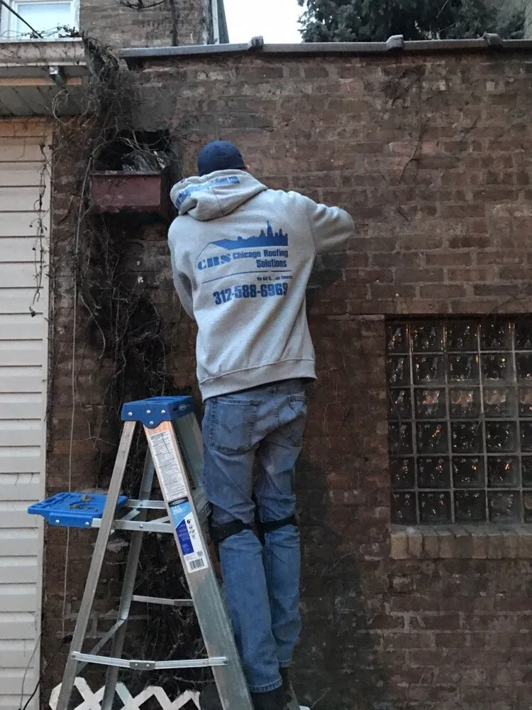 Slide of Chicago Roofing Solutions