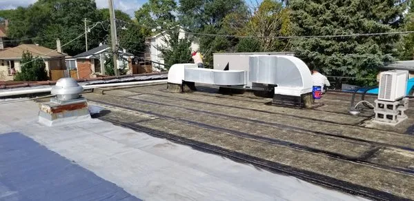 Chicago Roofing Specialist & Tuckpointing Logo