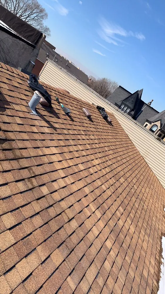 Slide of Chicago Seamless Gutters