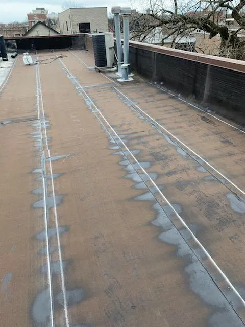 Slide of Chicago Seamless Gutters