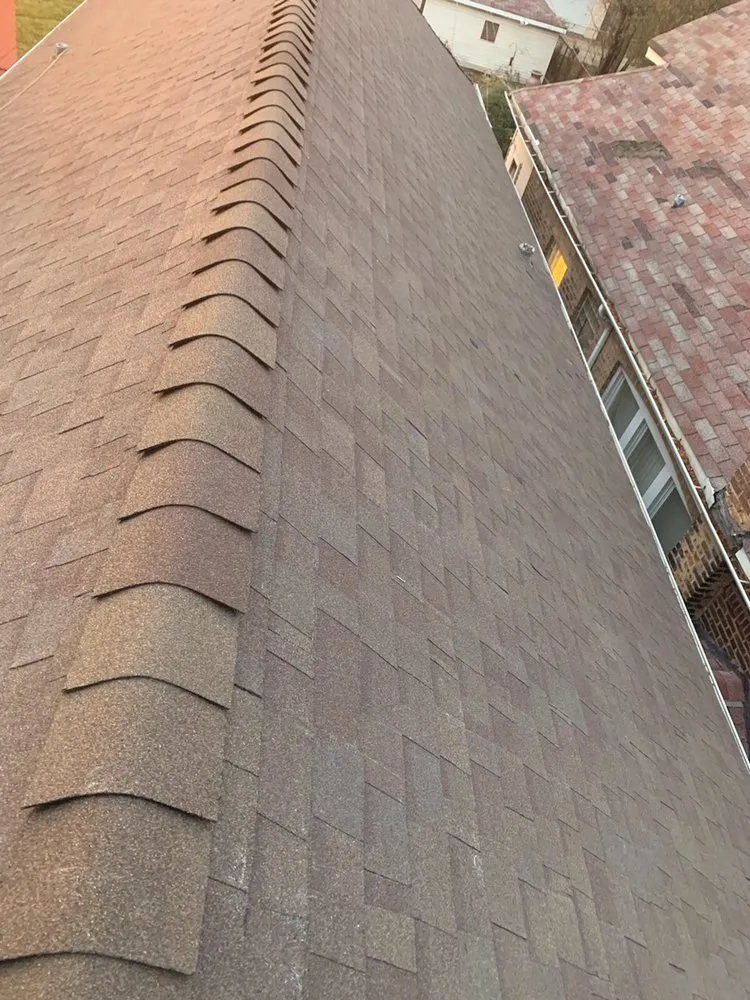 Slide of Chicago Seamless Gutters