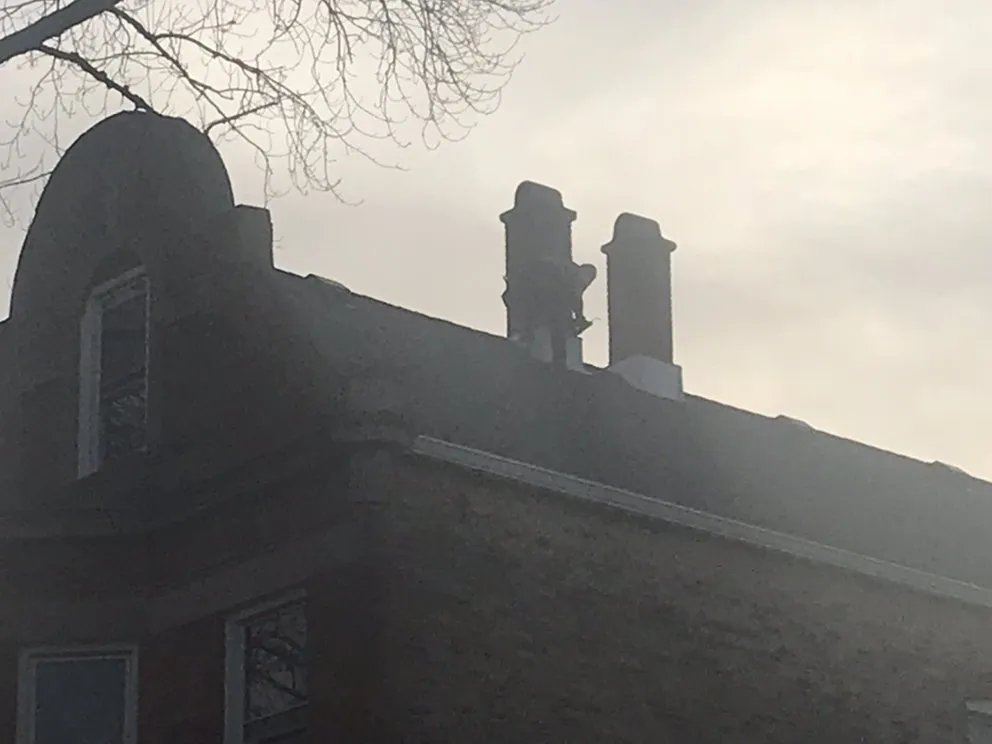 Slide of Chicago Seamless Gutters