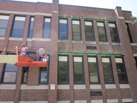 Slide of Chicagoland Flat Roofing Experts and Masonry