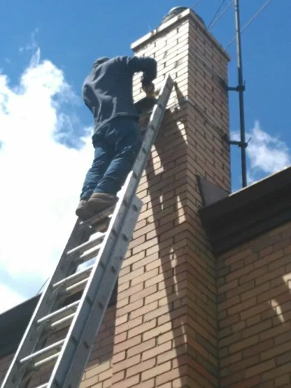 Slide of Chicago's Best Roofing and Tuckpointing