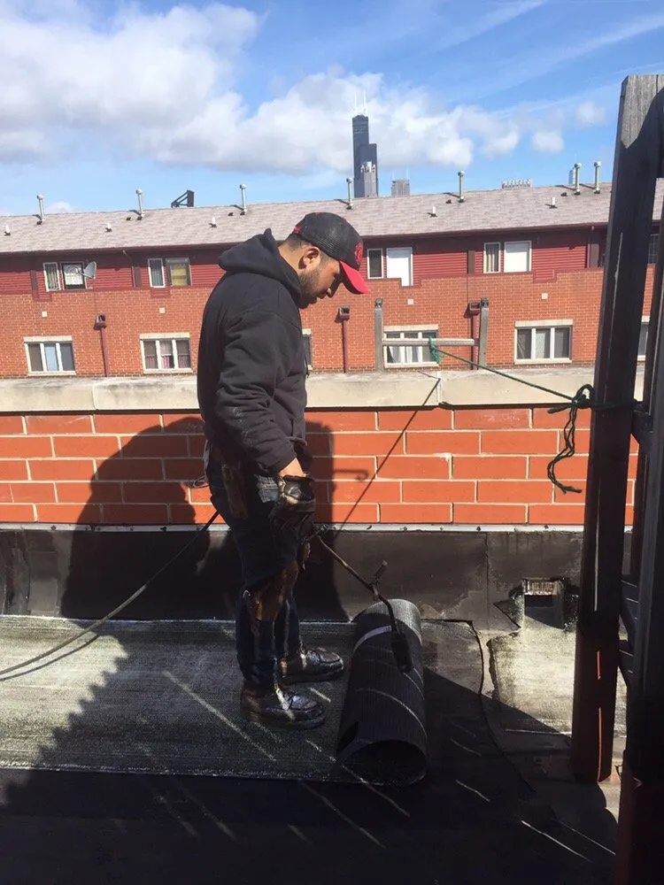 Slide of Chicago's Reasonable Roofing