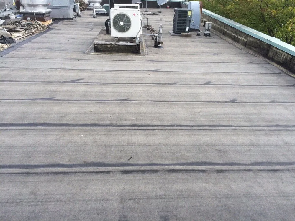 Slide of Chicago's Reasonable Roofing