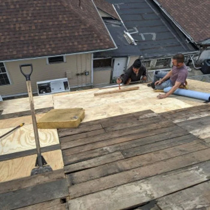Slide of Chimney Rock Roofing & Construction