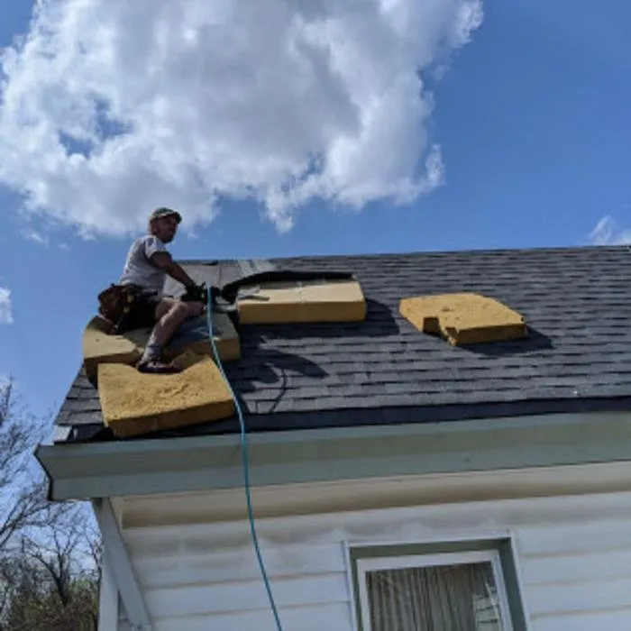 Slide of Chimney Rock Roofing & Construction