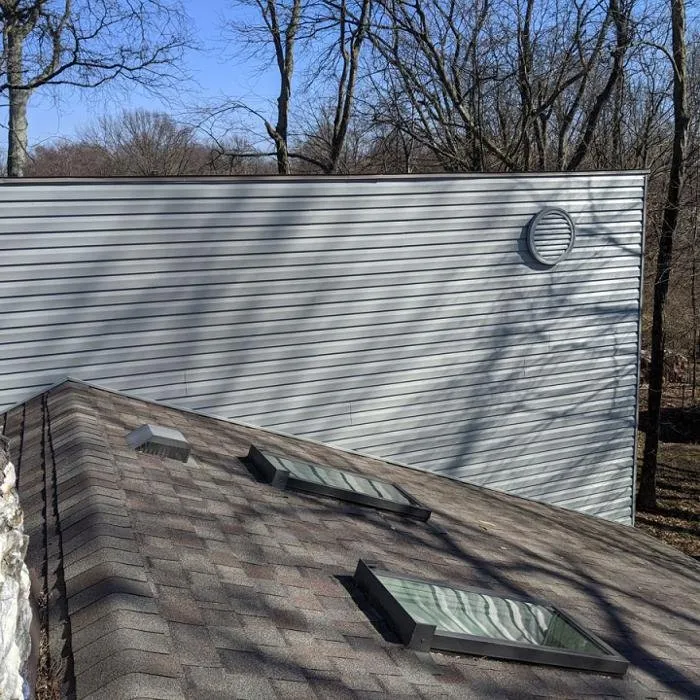 Slide of Chimney Rock Roofing & Construction