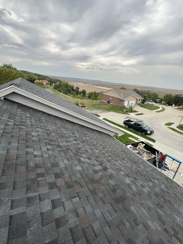 Slide of Chiwas Roofing & Construction