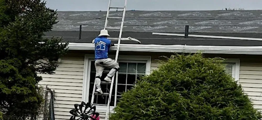 Slide of Chris Battaini Roofing & Seamless Gutters