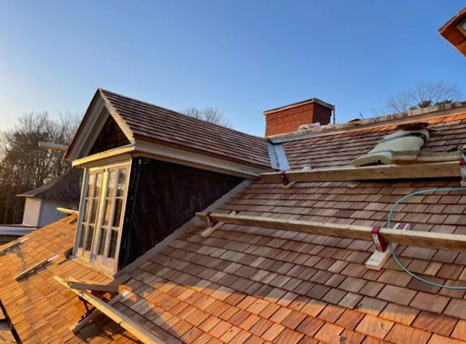 Slide of Chris Battaini Roofing & Seamless Gutters