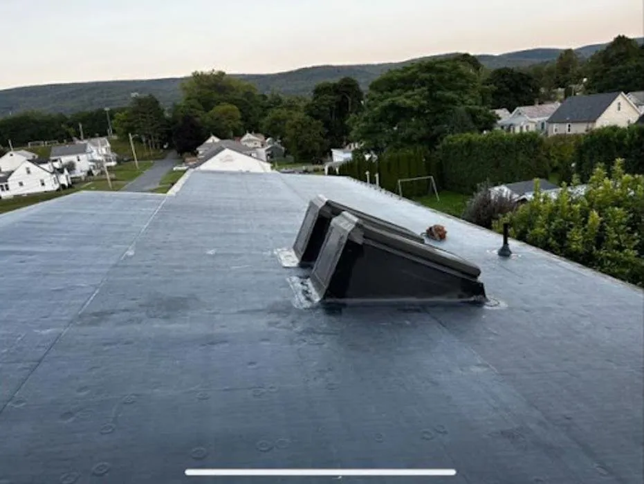 Slide of Chris Battaini Roofing & Seamless Gutters