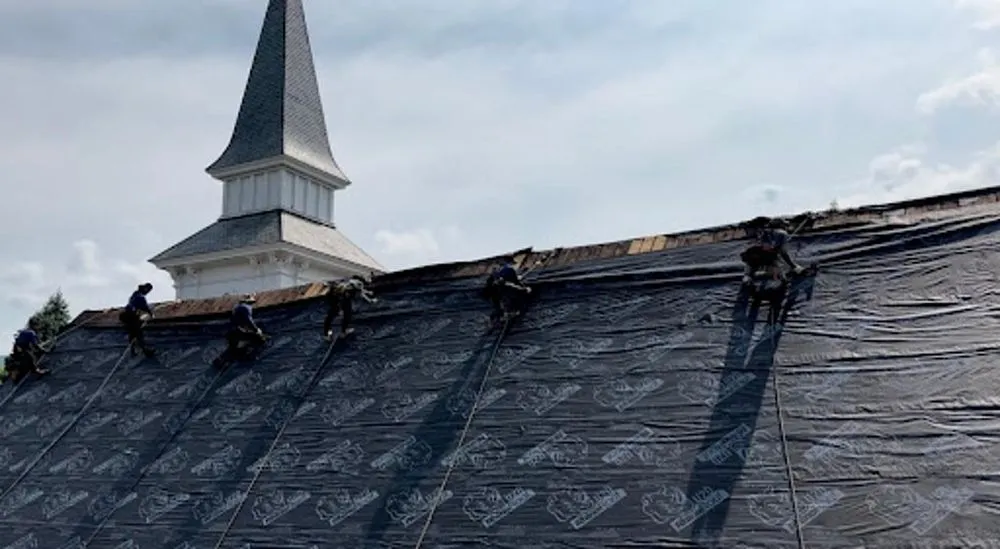 Slide of Chris Battaini Roofing & Seamless Gutters