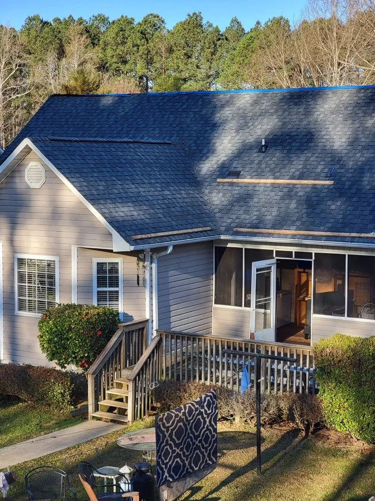 Slide of Chris Moore Roofing