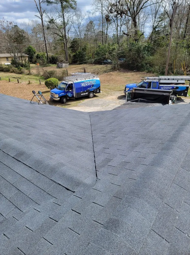 Slide of Chris Moore Roofing