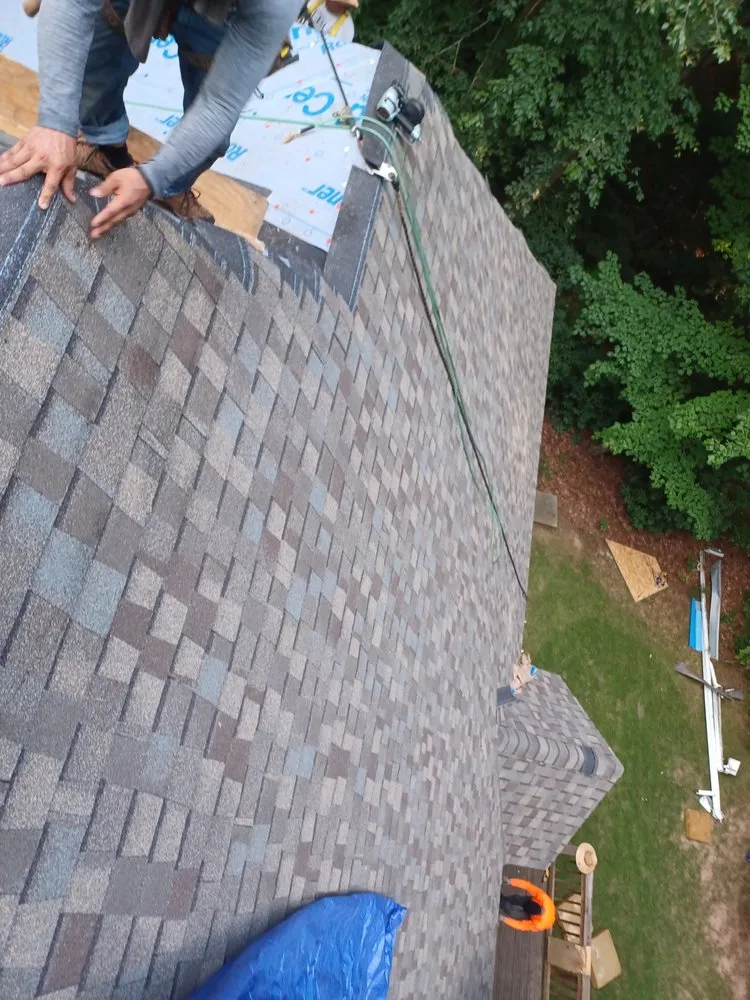 Slide of Chris Roofing Company