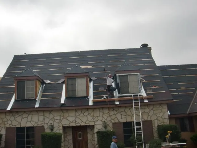 Slide of Christensen Roofing