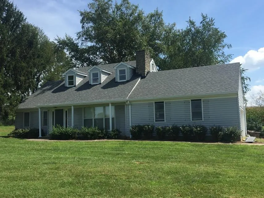 Slide of Christian Brothers Roofing