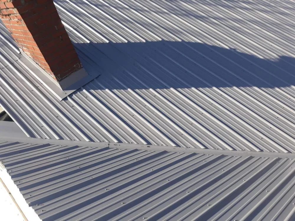 Slide of Christians Metal Roofing and Construction