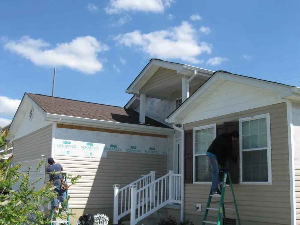 Slide of CHS Roofing and Siding