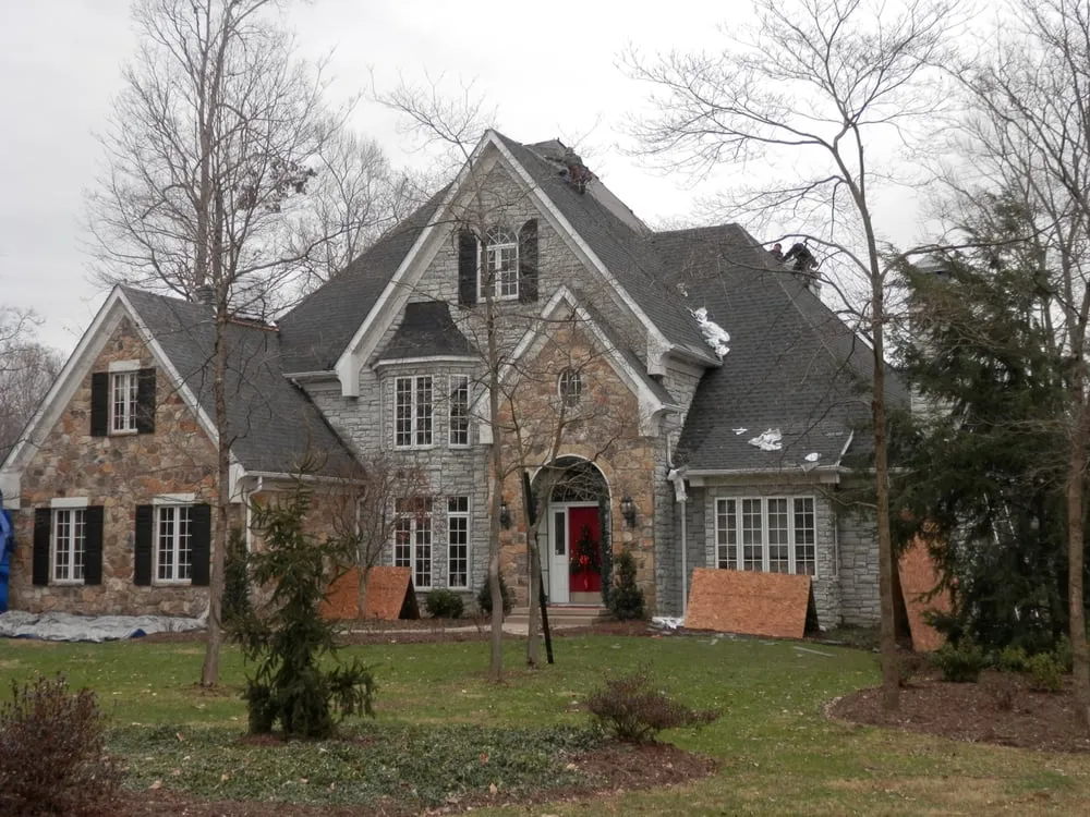 Slide of CHS Roofing and Siding