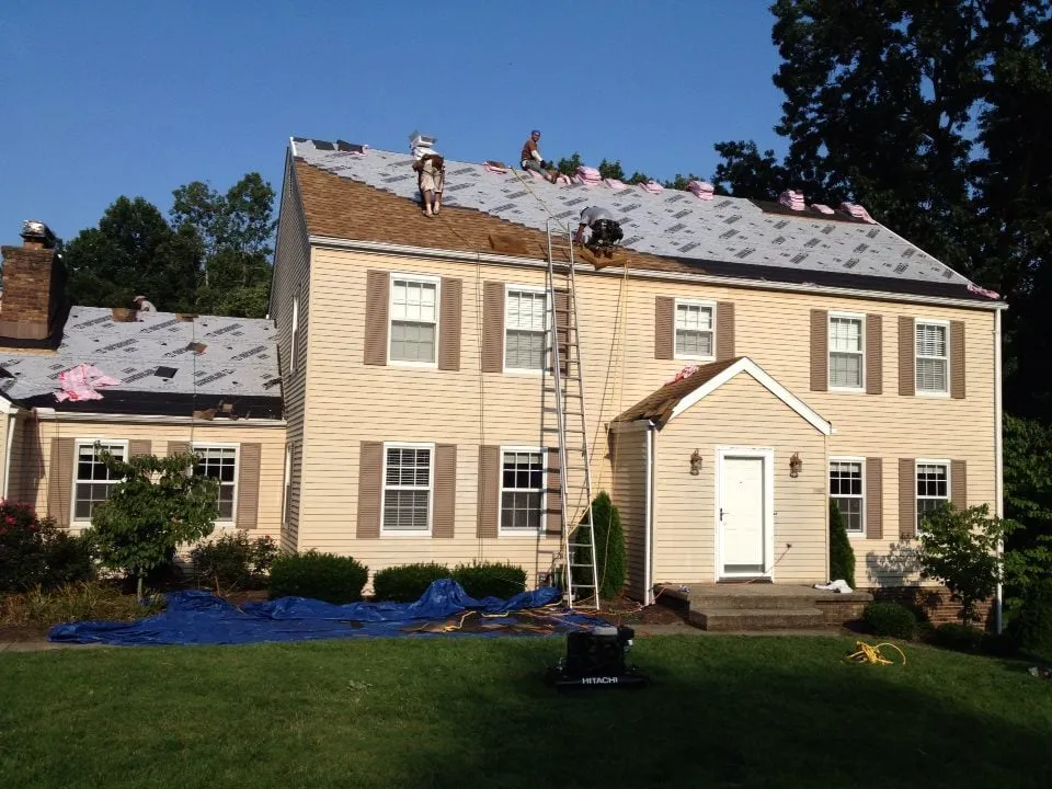 Slide of CHS Roofing and Siding