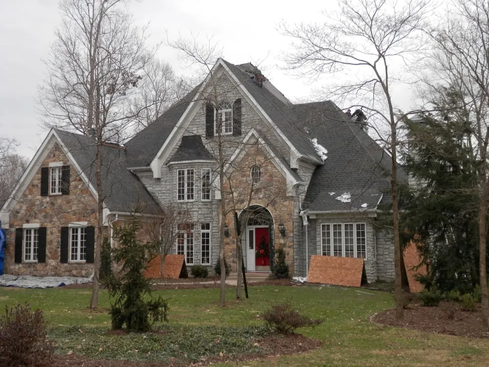 Slide of CHS Roofing and Siding