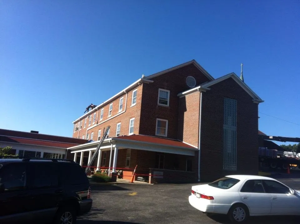 Slide of CHS Roofing and Siding