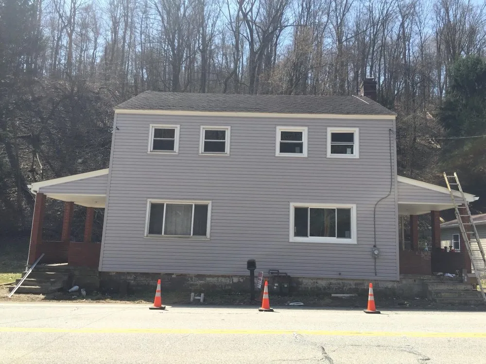 Slide of Chuck Romea Roofing